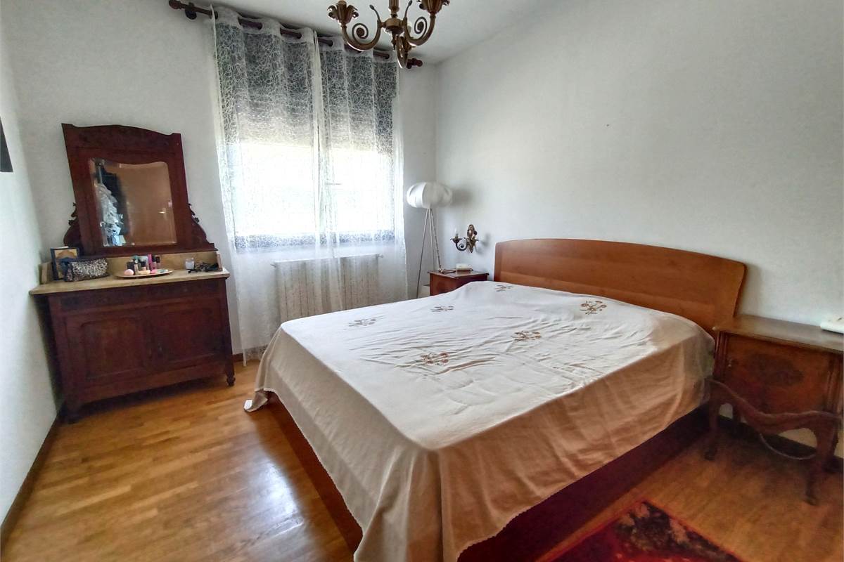 ERBA AMPIO QUADRILOCALE CON TERRAZZO