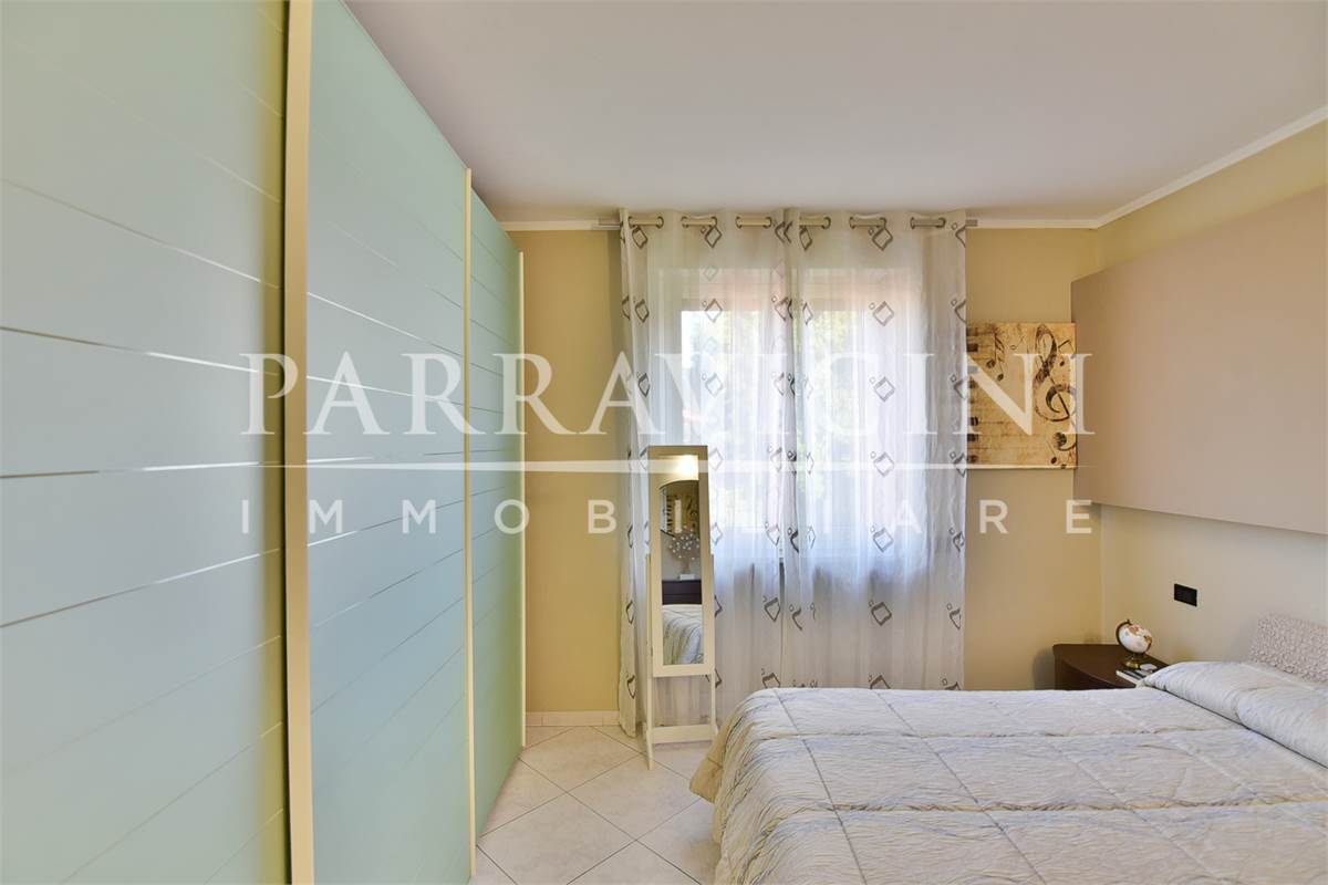 Curato trilocale con cucina abitabile balconi e box