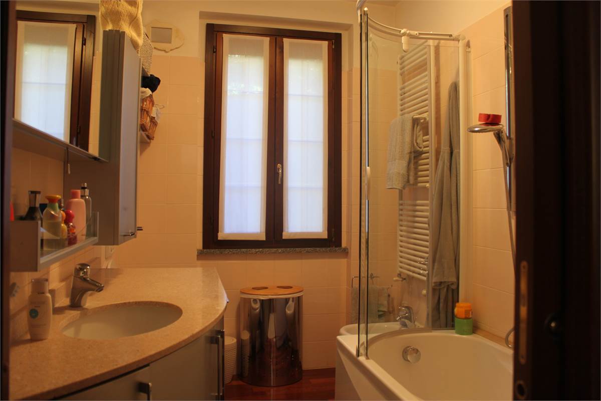 TRILOCALE con giardino privato e box doppio in POSIZIONE CENTRALISSIMA