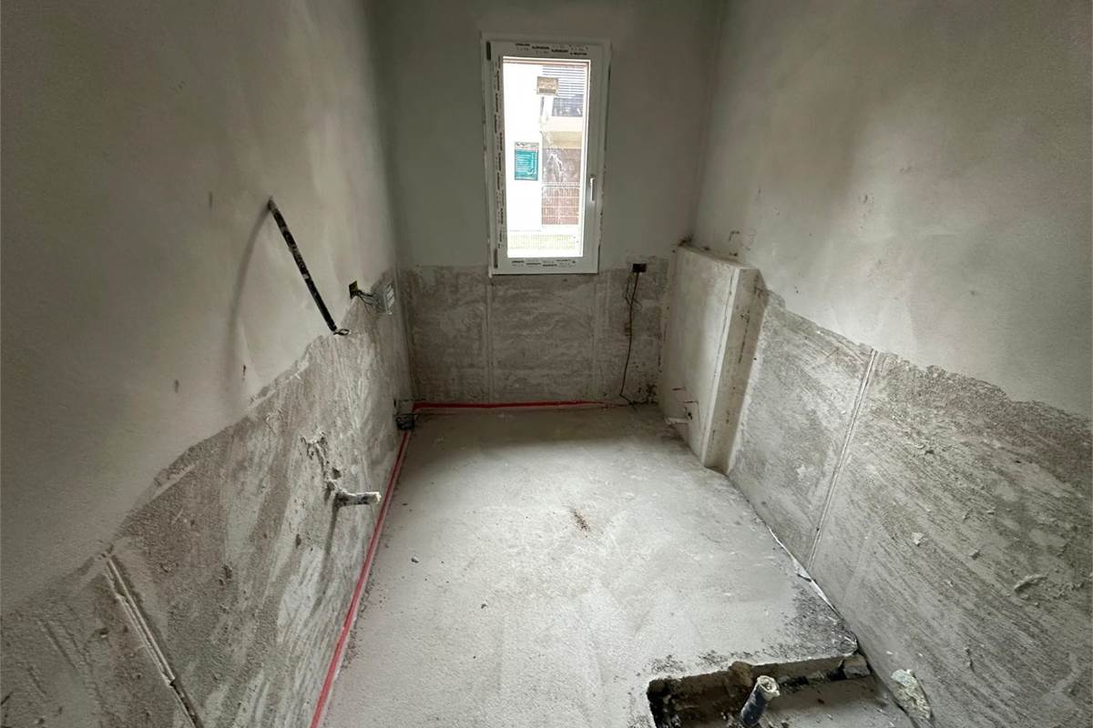 ROVELLASCA NUOVO TRILOCALE CON GIARDINO