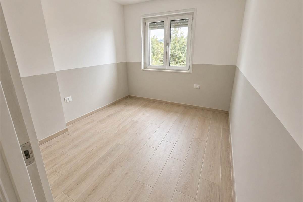 LOMAZZO MANERA NUOVO BILOCALE  IN CORTE CON POSTO AUTO