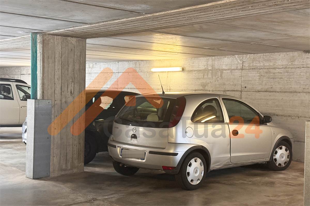 Luminoso bilocale con terrazzino e posto auto coperto