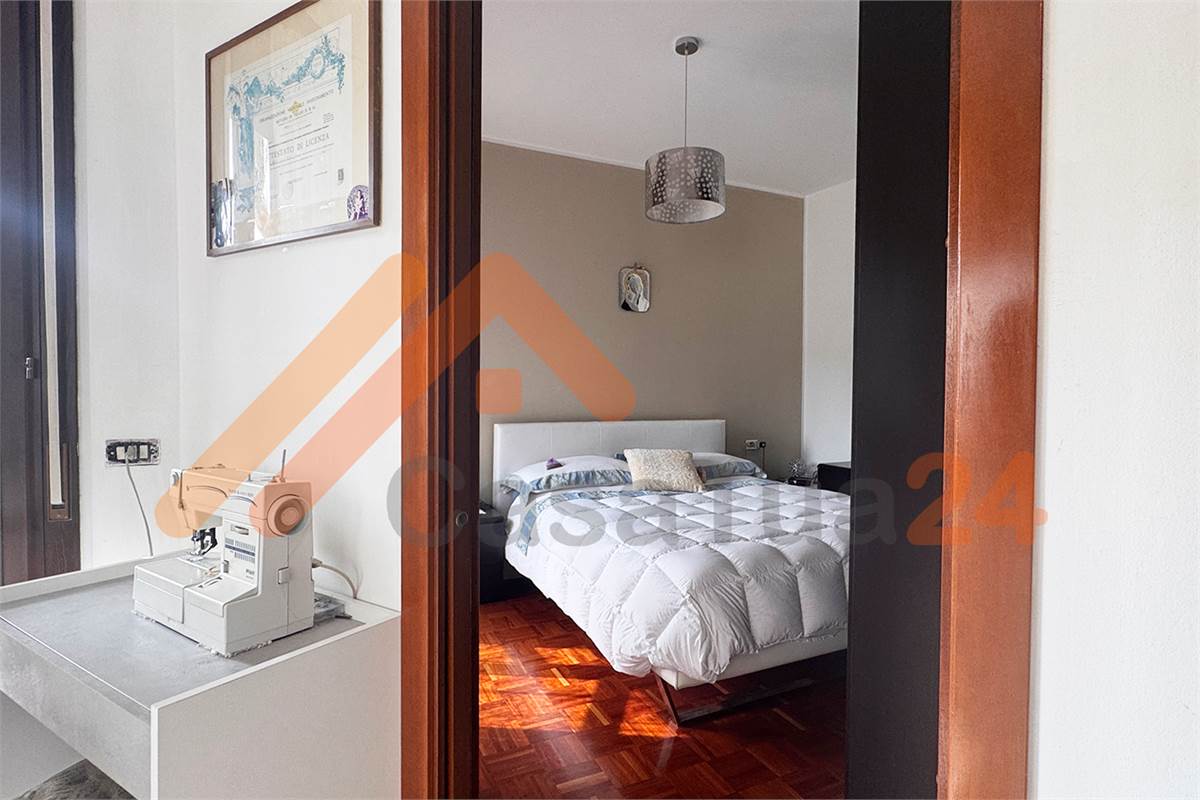 Luminoso bilocale con terrazzino e posto auto coperto