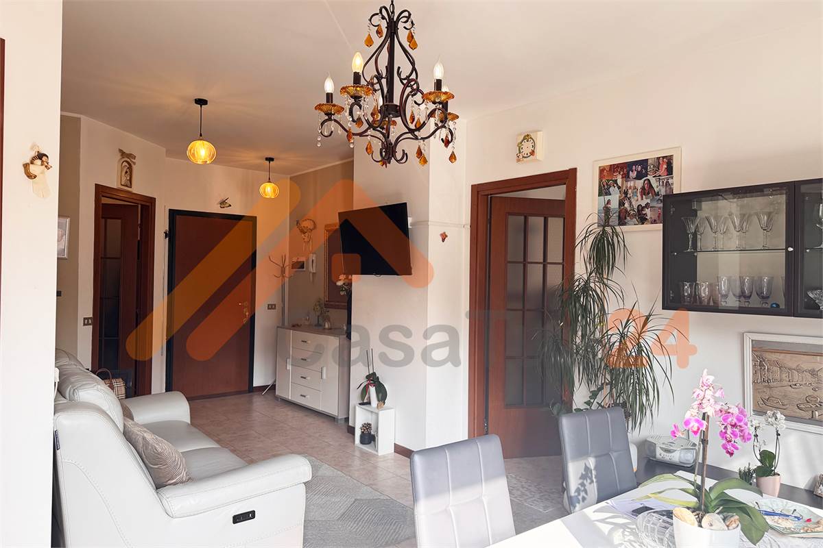 Luminoso bilocale con terrazzino e posto auto coperto