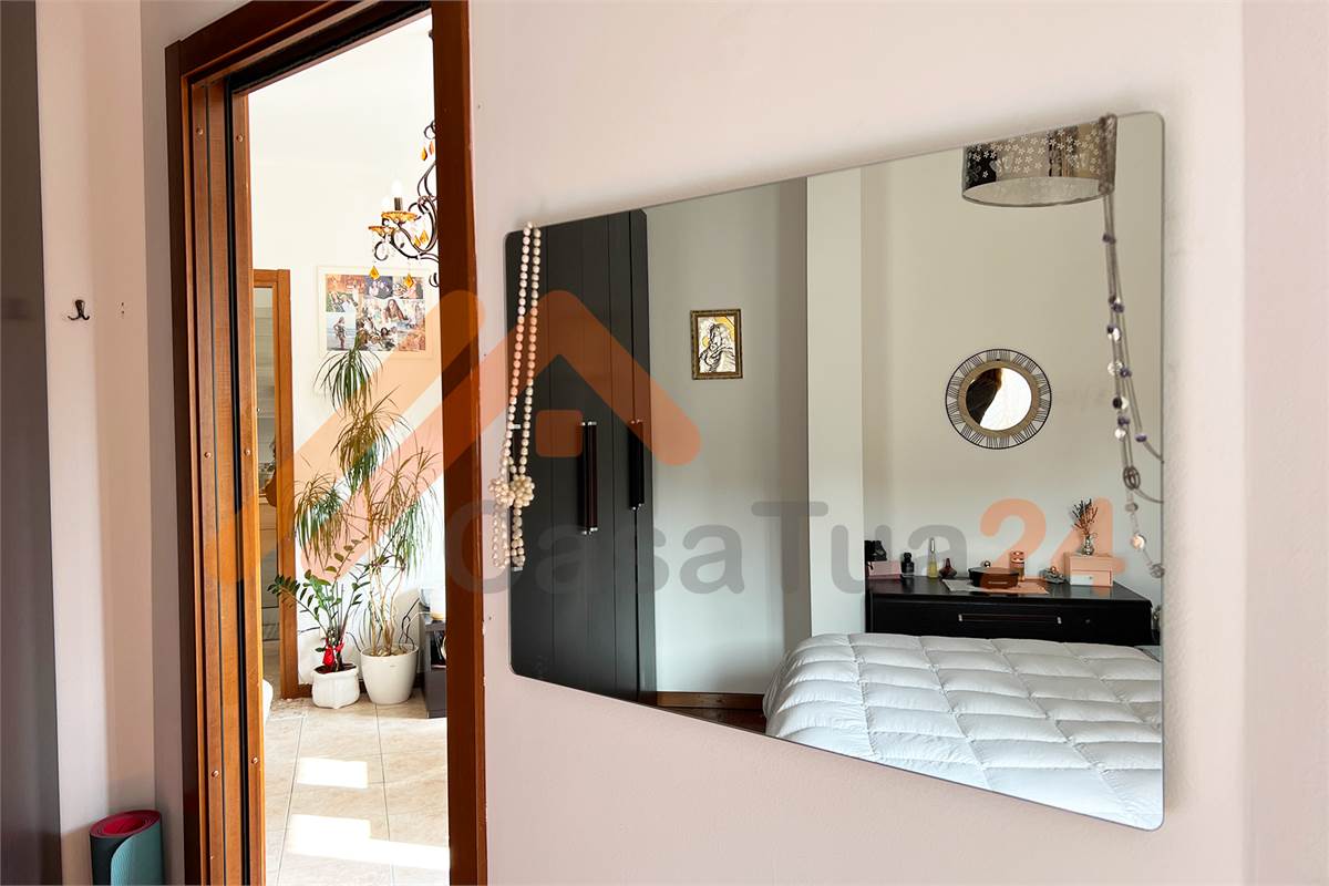 Luminoso bilocale con terrazzino e posto auto coperto