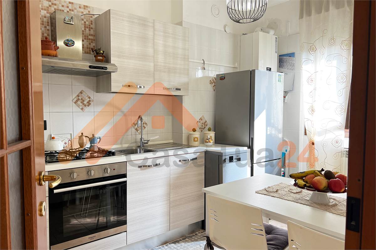 Luminoso bilocale con terrazzino e posto auto coperto