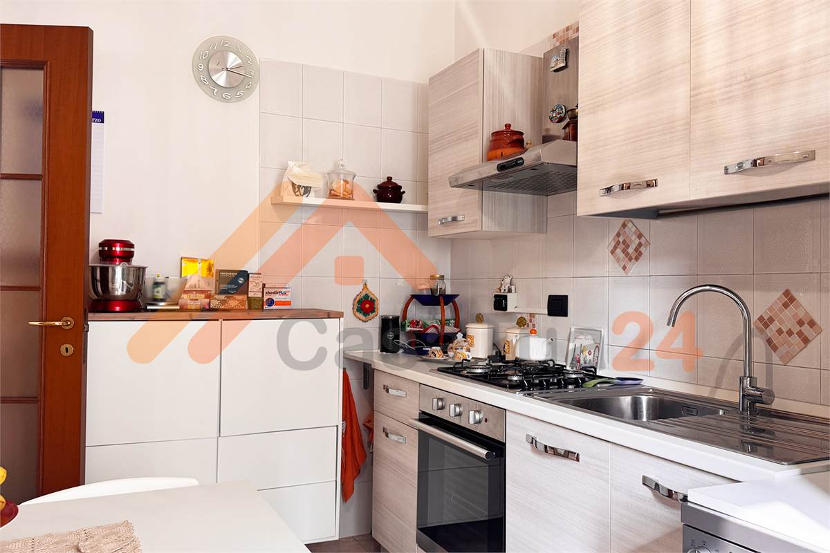 Luminoso bilocale con terrazzino e posto auto coperto