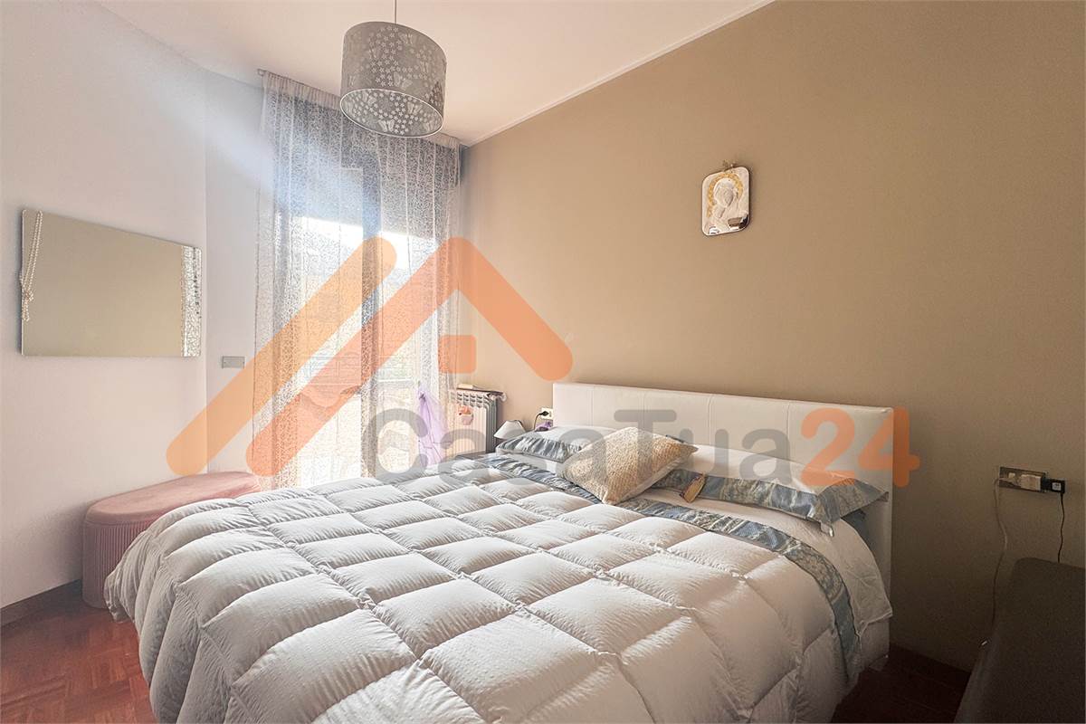 Luminoso bilocale con terrazzino e posto auto coperto