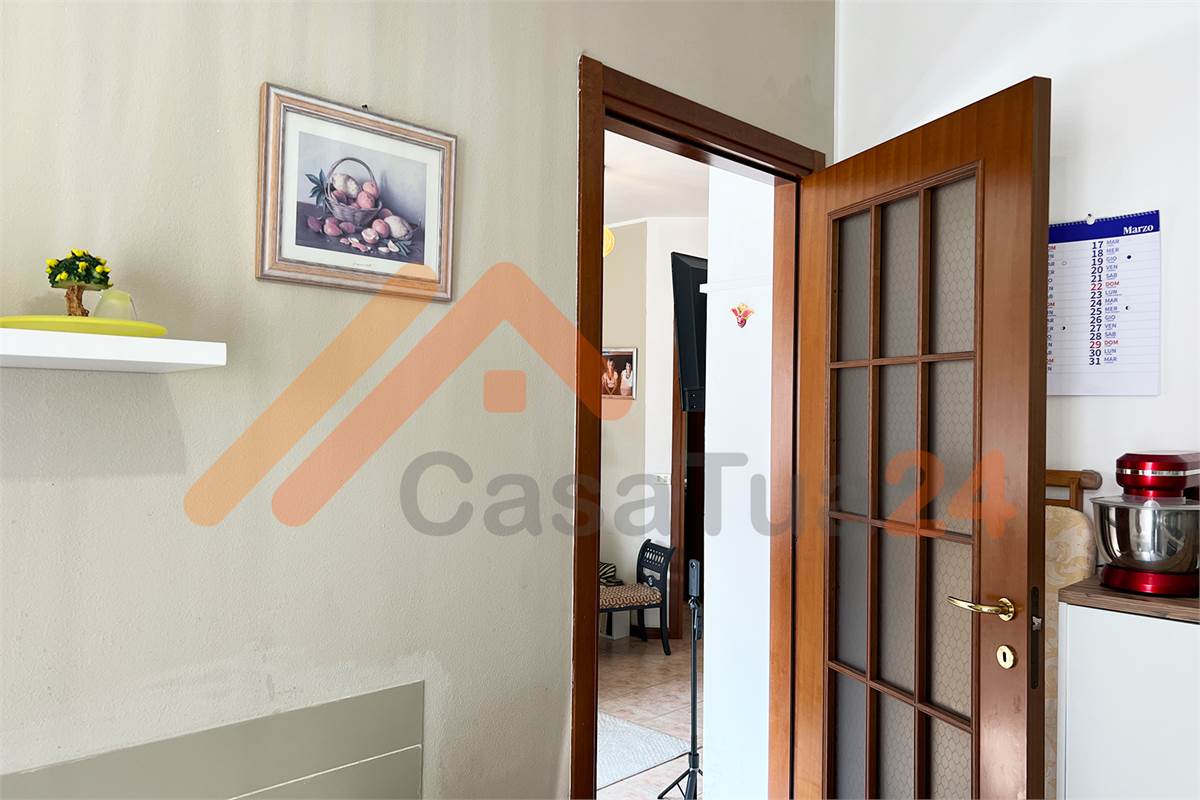 Luminoso bilocale con terrazzino e posto auto coperto