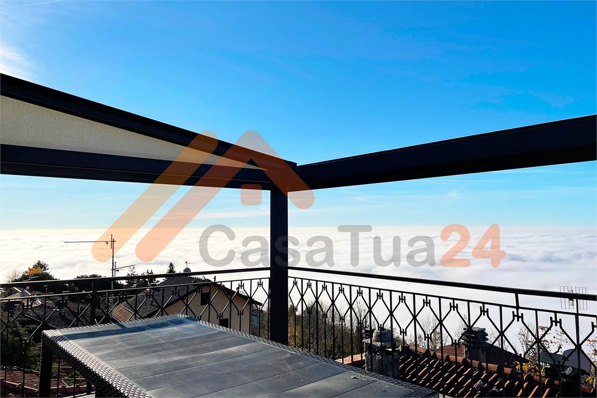 Attico bilocale in vendita con terrazza e vista panoramica