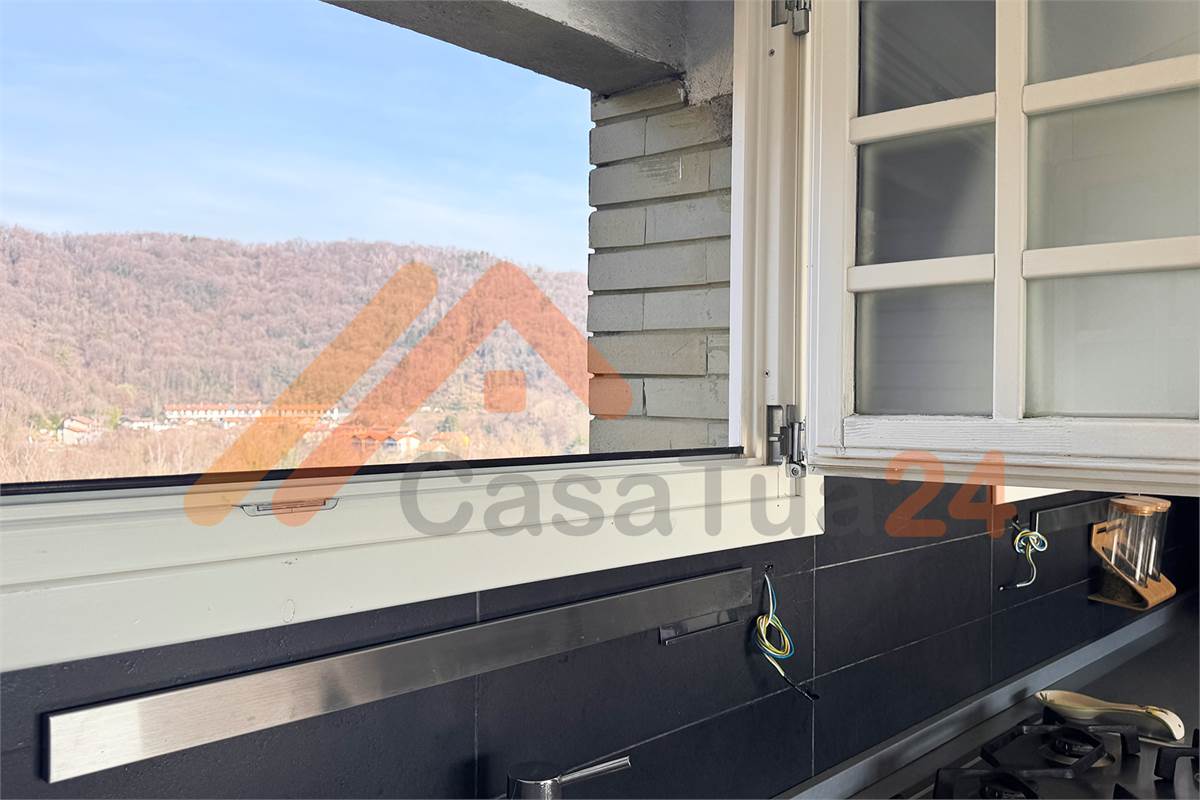 Attico bilocale in vendita con terrazza e vista panoramica