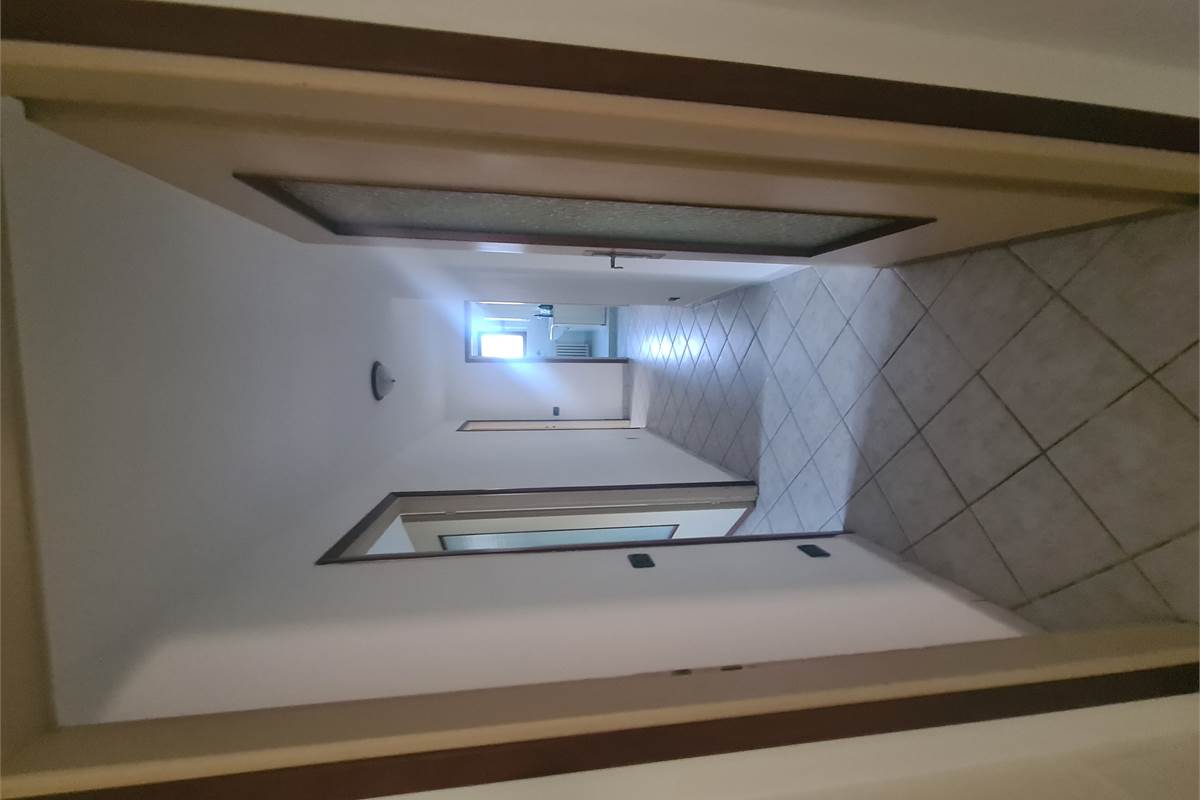 TRILOCALE RISTRUTTURATO CON GIARDINO