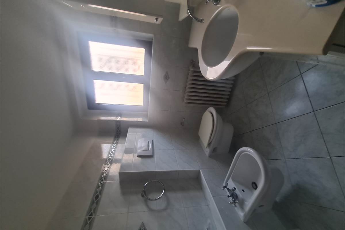 TRILOCALE RISTRUTTURATO CON GIARDINO