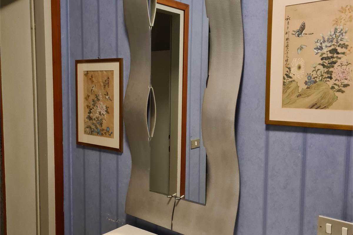 GRANDE BILOCALE CON BALCONATA E POSTO AUTO