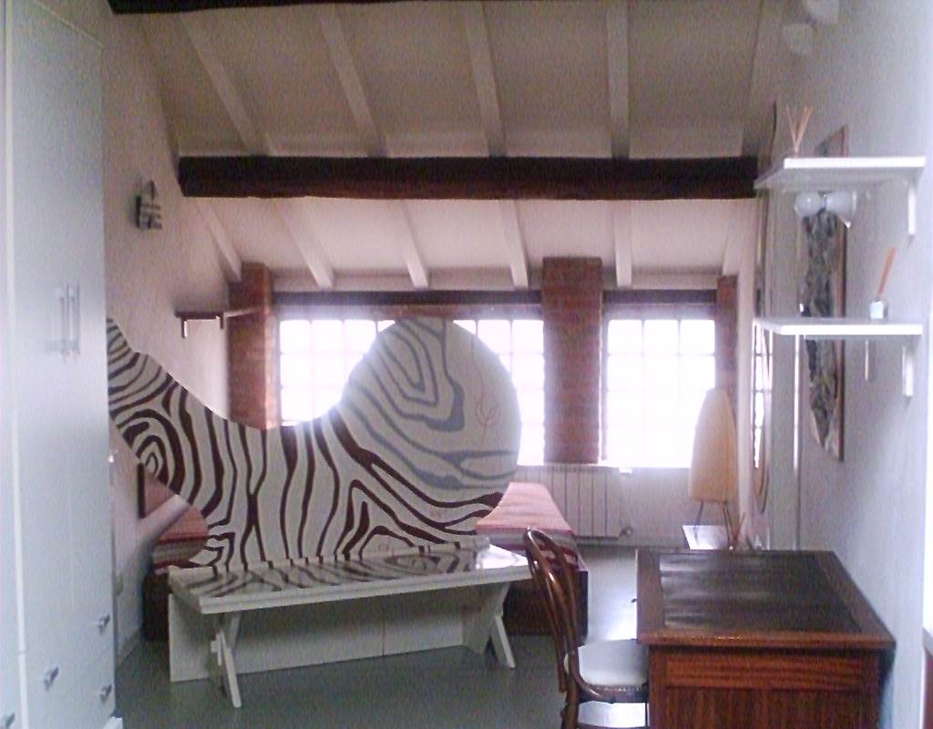 ACCOGLIENTE MONOLOCALE ARREDATO CON TERRAZZO