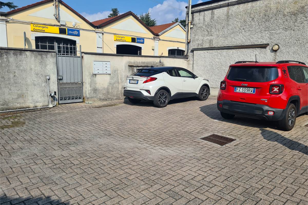 Ampio bilocale con giardino, cantina e posto auto