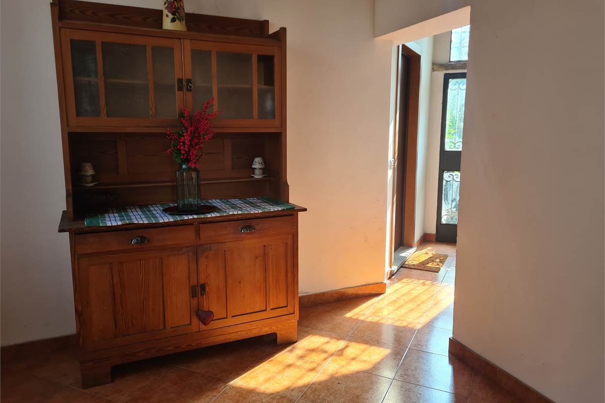 Ampio bilocale con giardino, cantina e posto auto