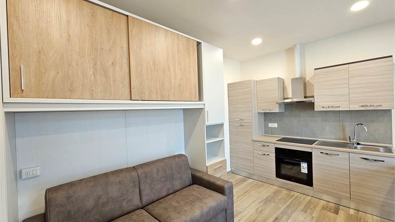 Monolocale ristrutturato con posto auto in casa d’epoca a Grandate