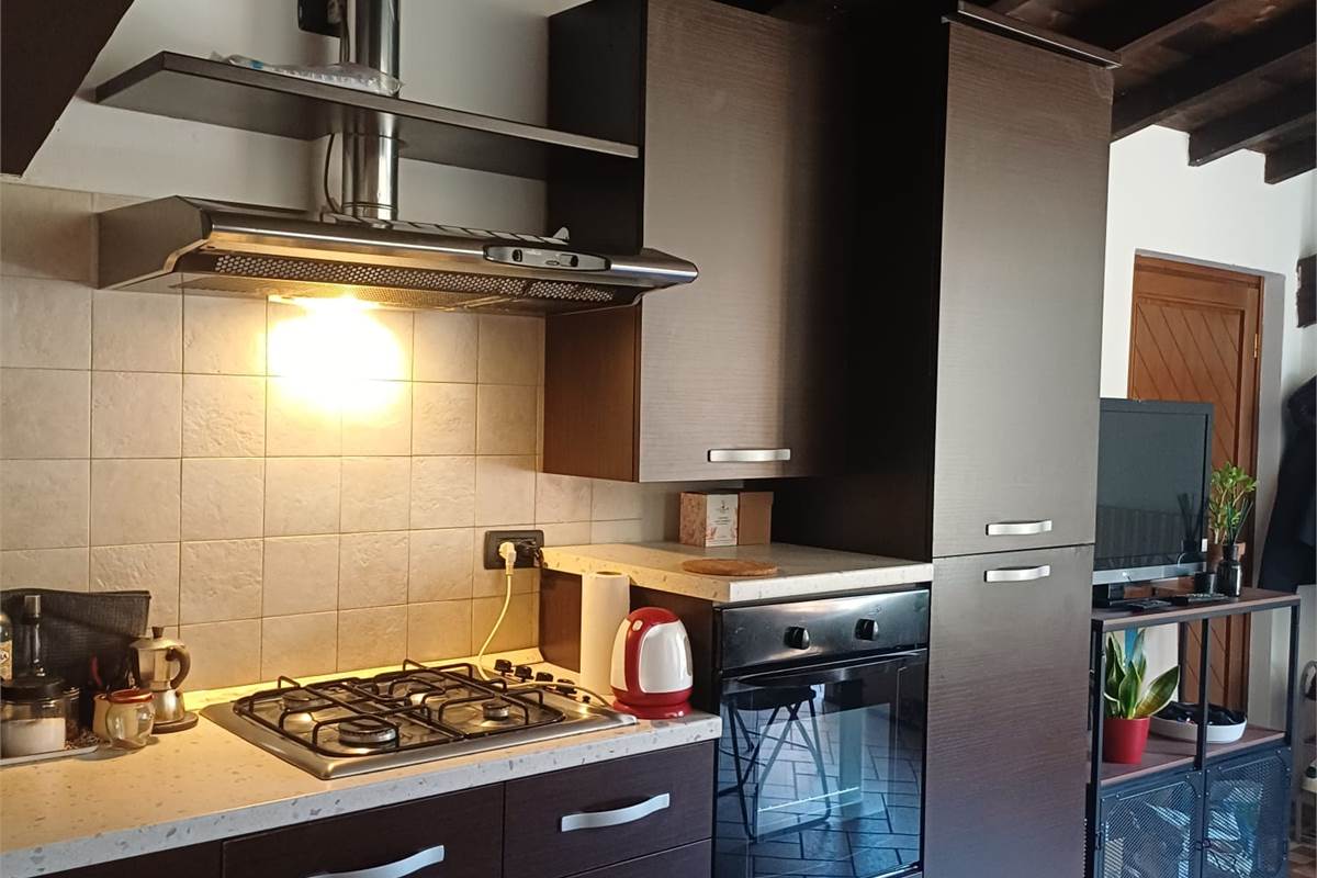 Appartamento nuovo con ampio terrazzo e box in zona servita