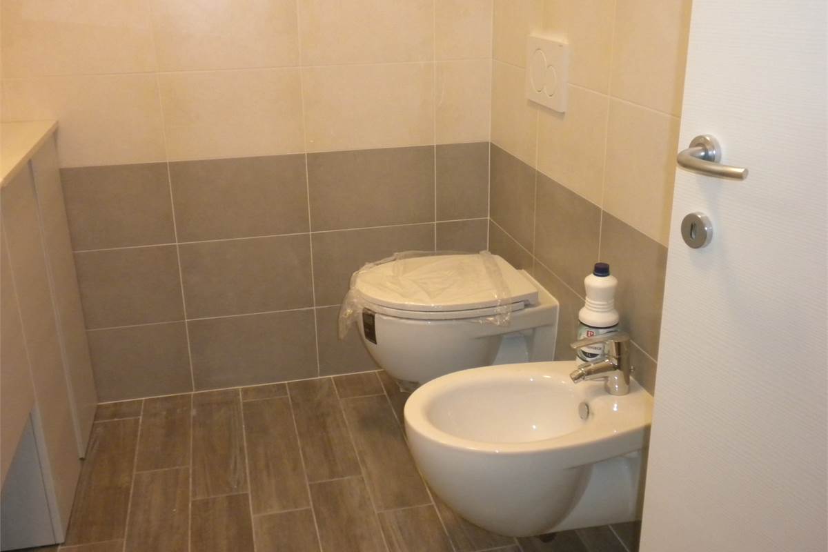 Bilocale luminoso con balcone e box in contesto tranquillo con ascensore