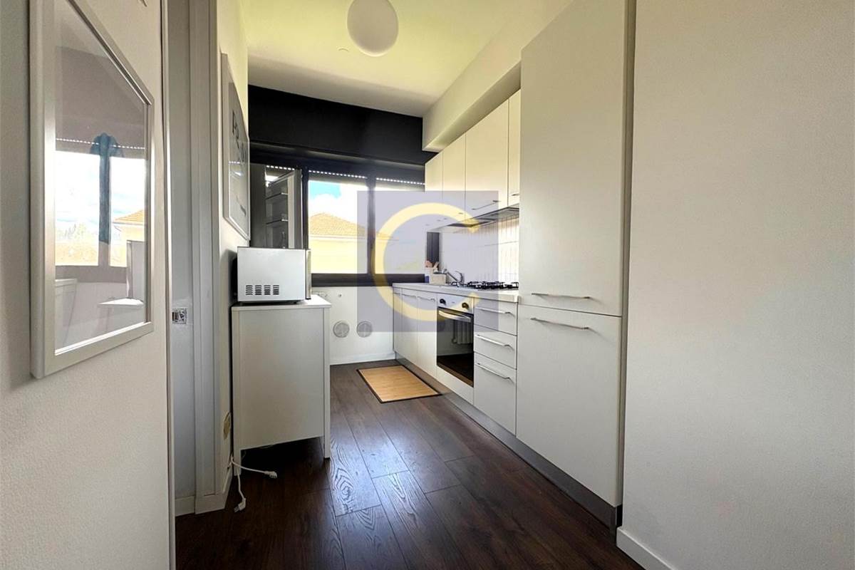 GRAZIOSO BILOCALE CON TERRAZZO PANORAMICO