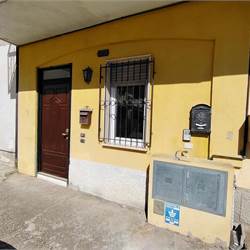 Ampio trilocale con giardino 