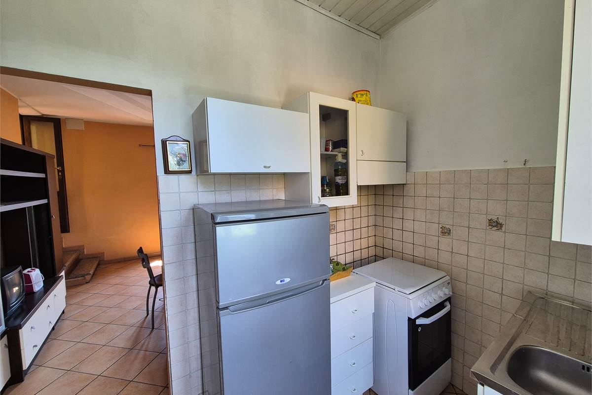 Bilocale in  corte con posto auto privato