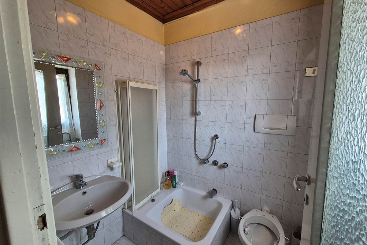 Bilocale in  corte con posto auto privato