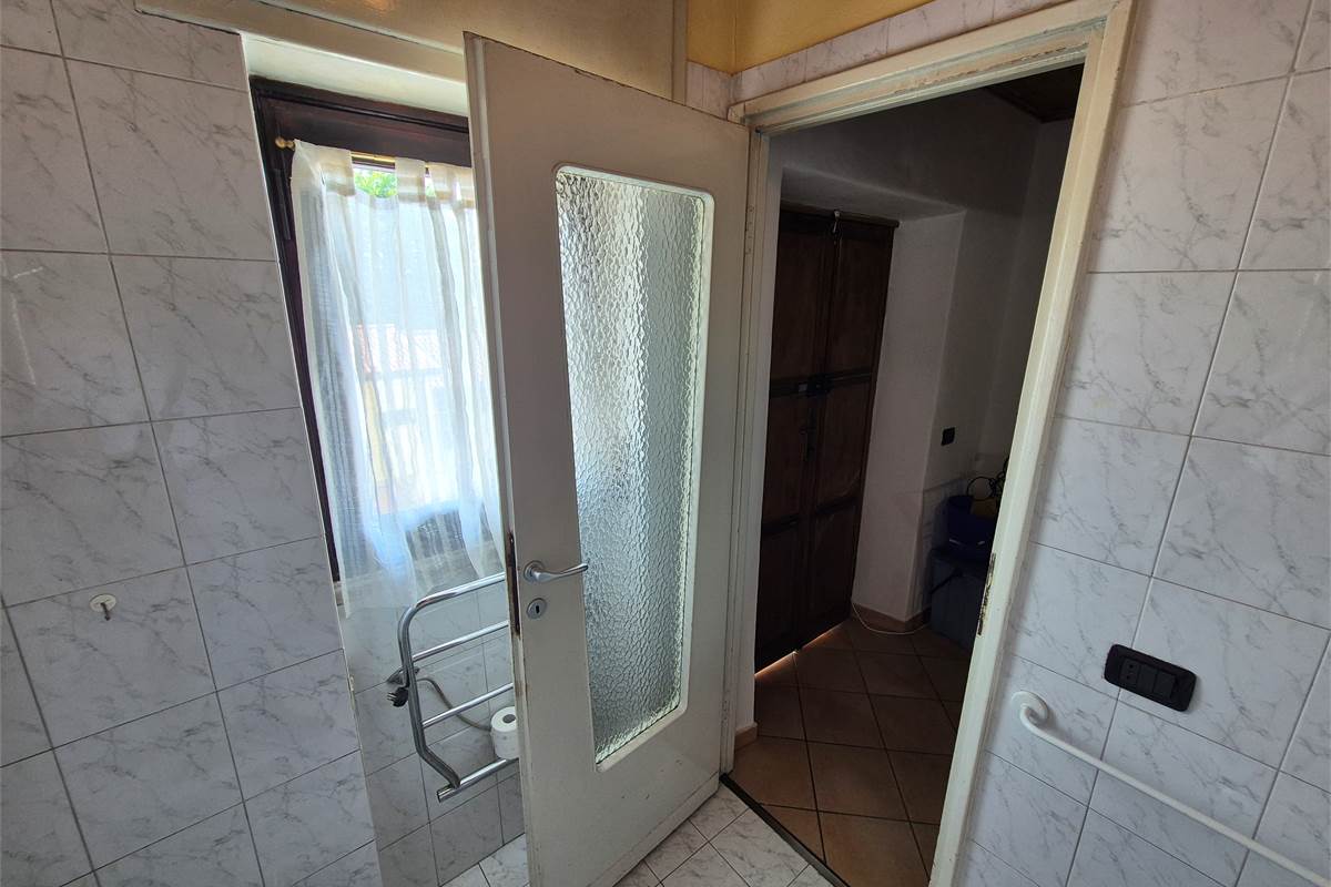 Bilocale in  corte con posto auto privato