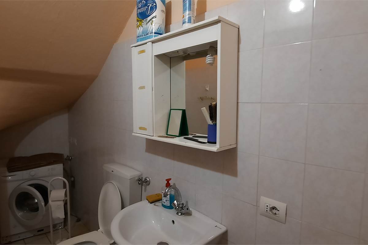Quadrilocale con box e sottotetto