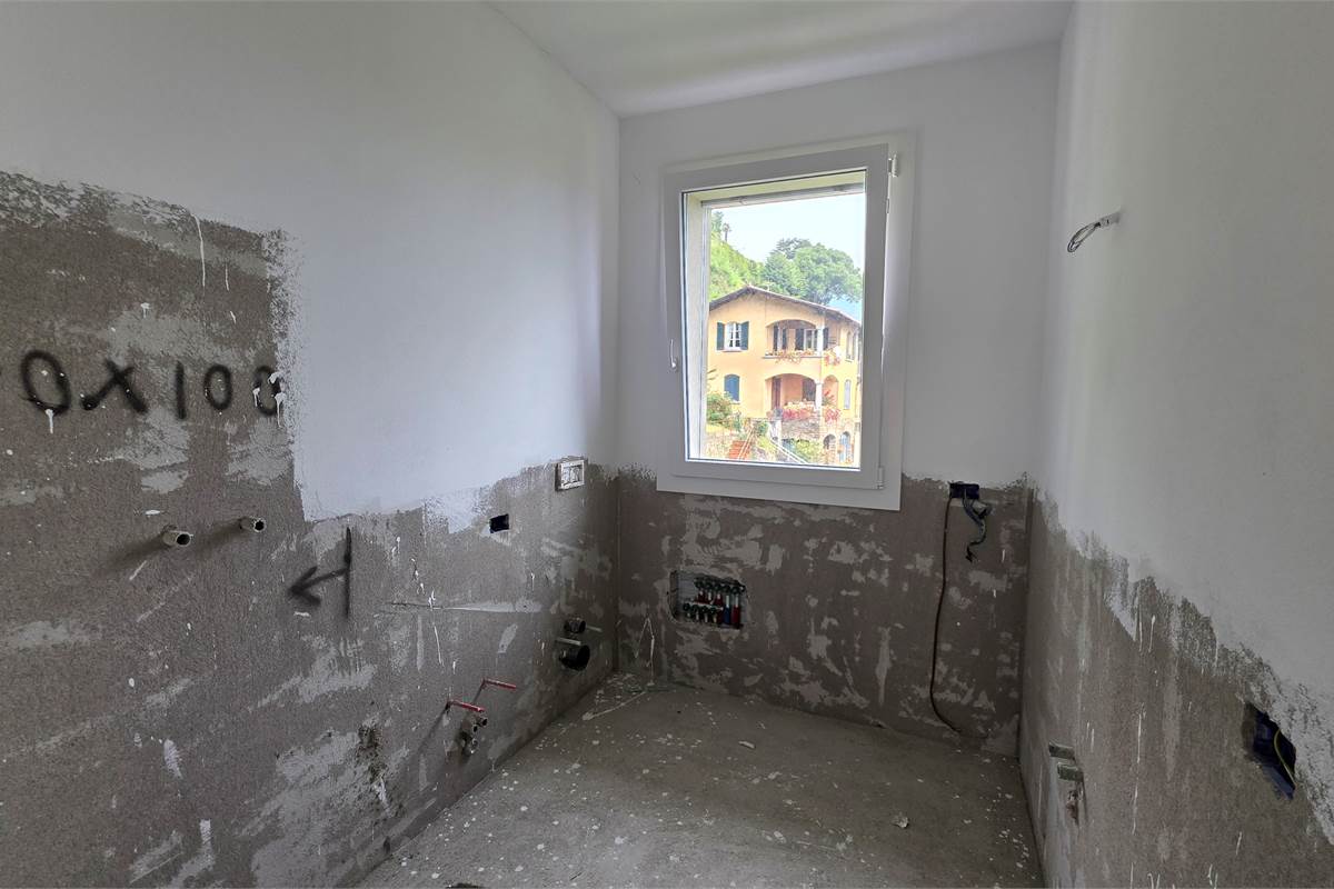 Ampio trilocale NUOVO con vista lago