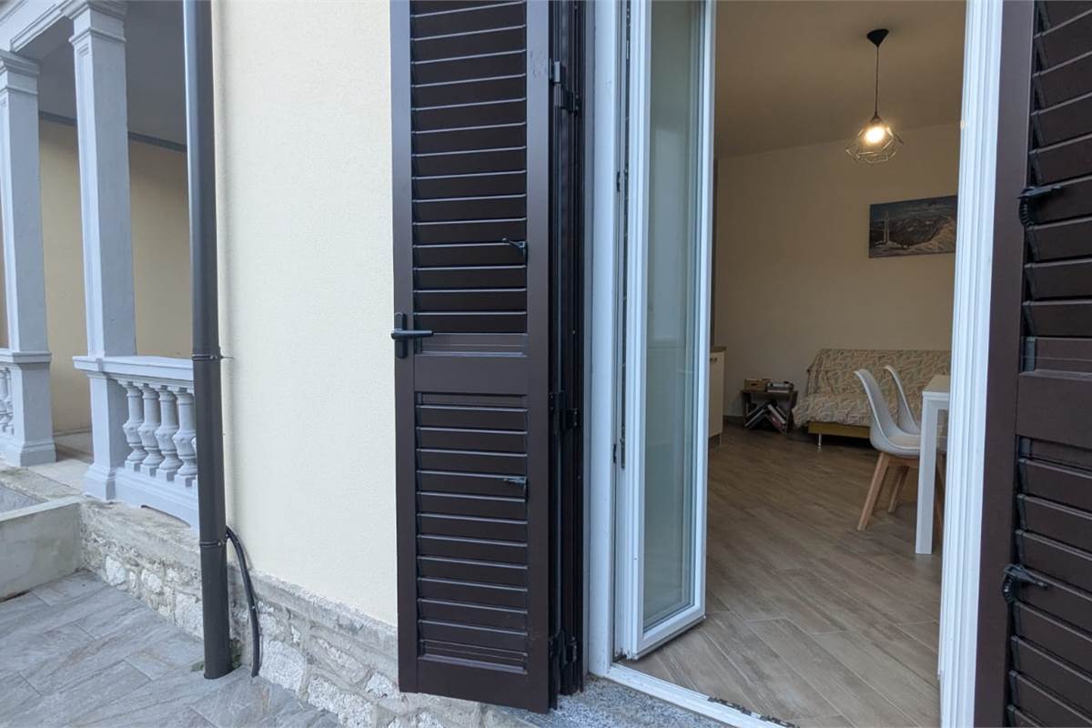 Bilocale arredato con giardino box e posto auto
