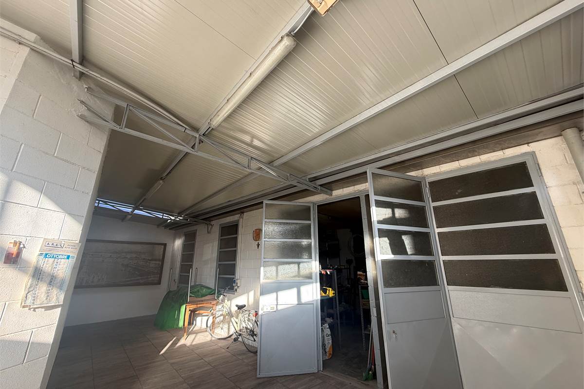 Quadrilocale con box e sottotetto