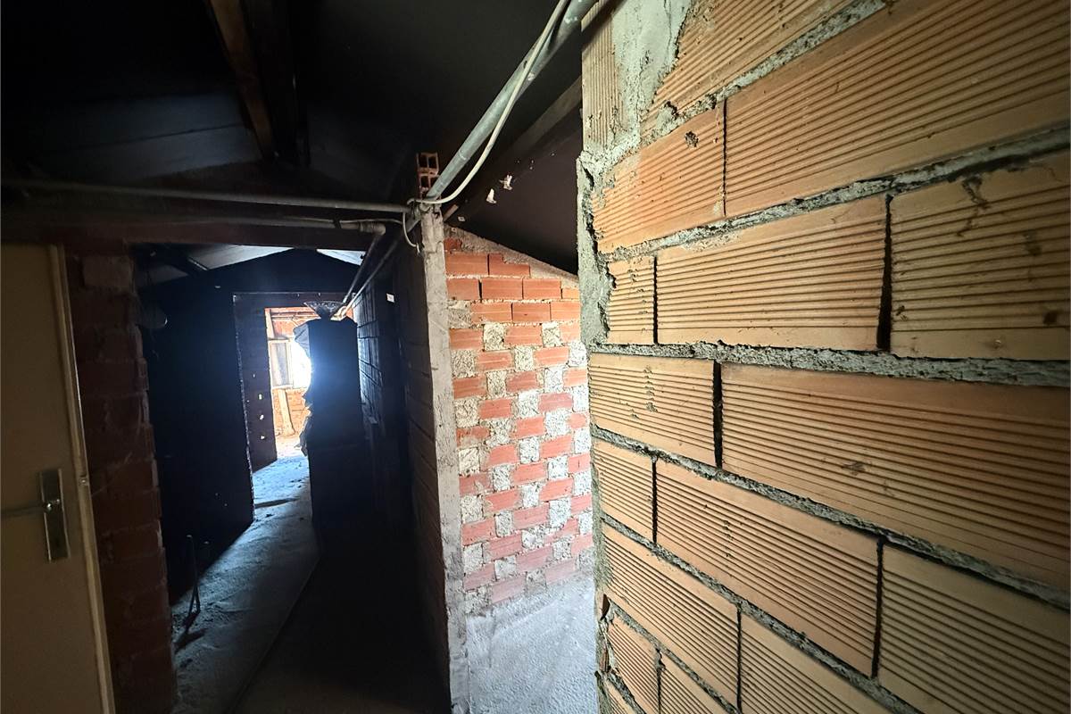 Quadrilocale con box e sottotetto