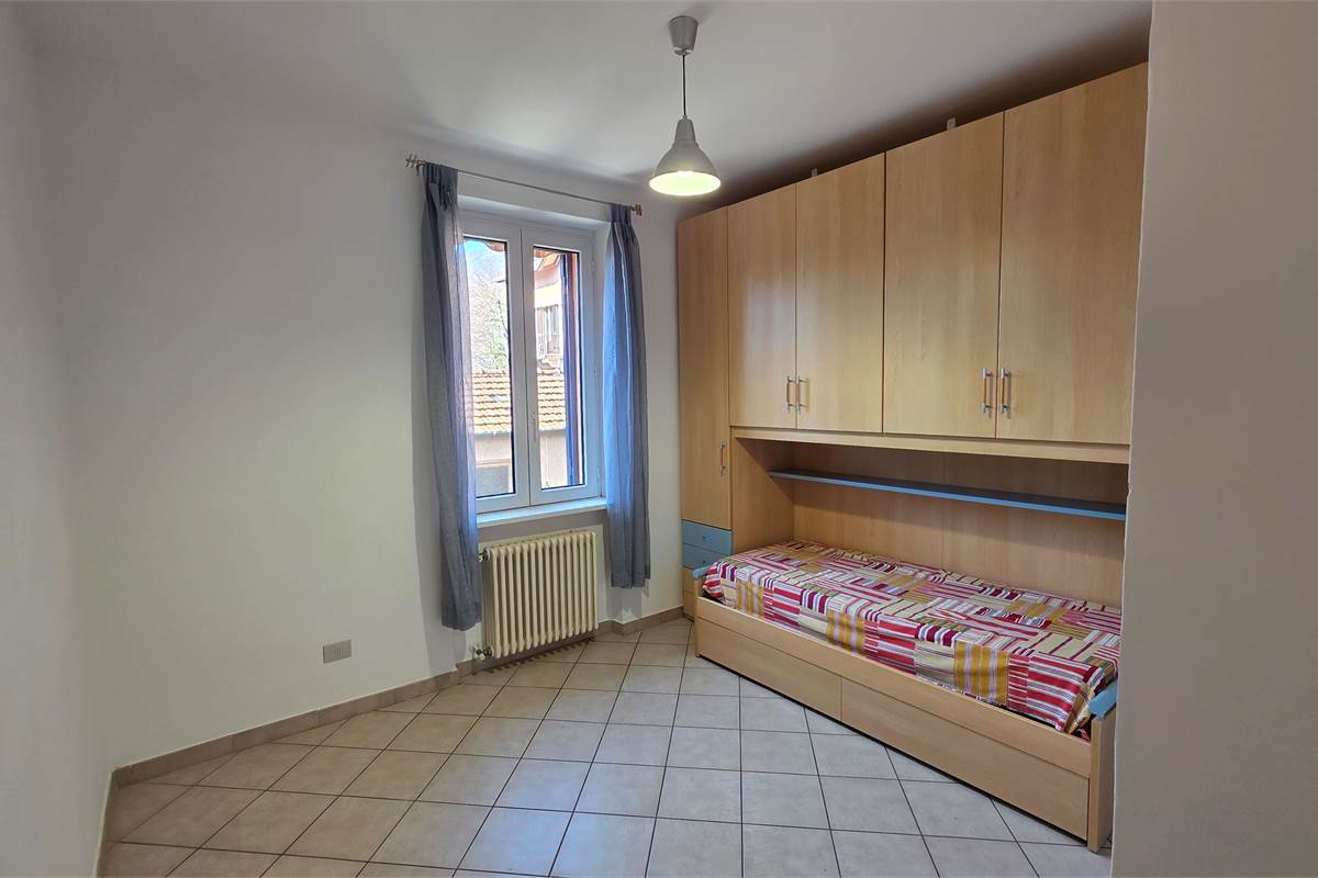 Trilocale con giardino e posto auto a Tremezzina 