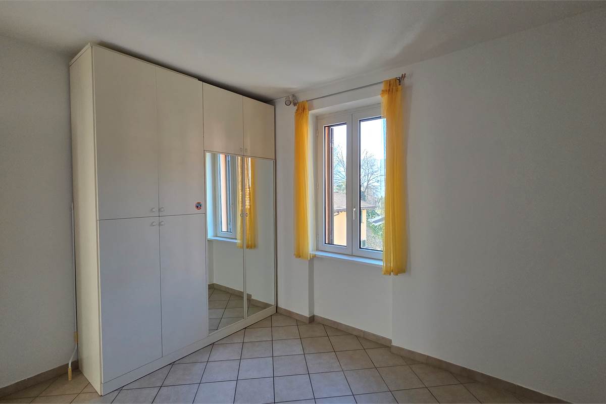 Trilocale con giardino e posto auto a Tremezzina 