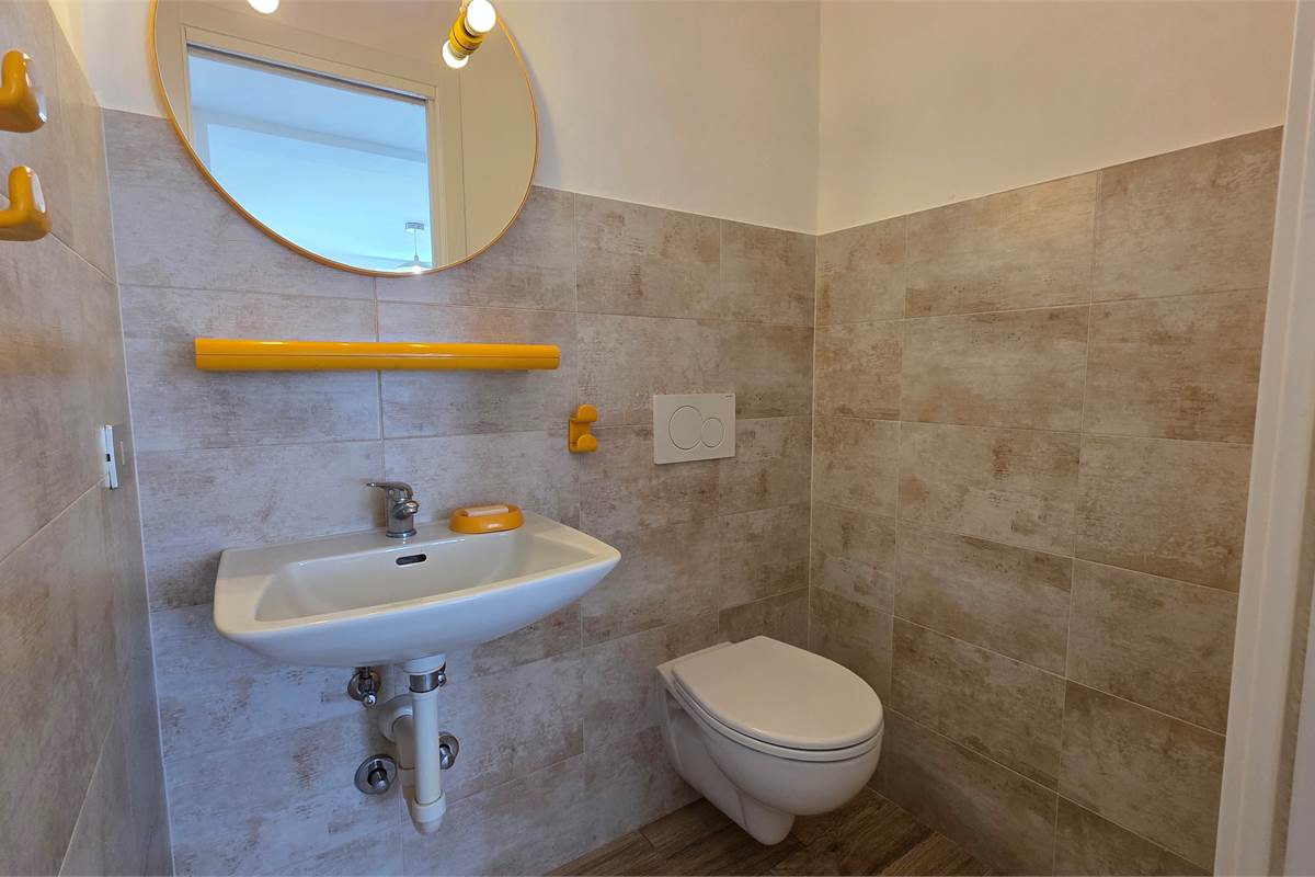 Trilocale con giardino e posto auto a Tremezzina 