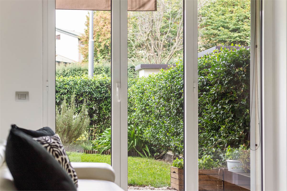 TRILOCALE CON GIARDINO PRIVATO