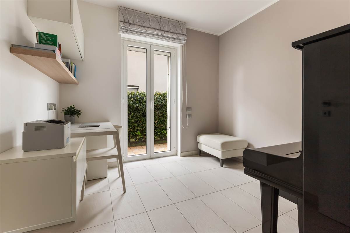 TRILOCALE CON GIARDINO PRIVATO