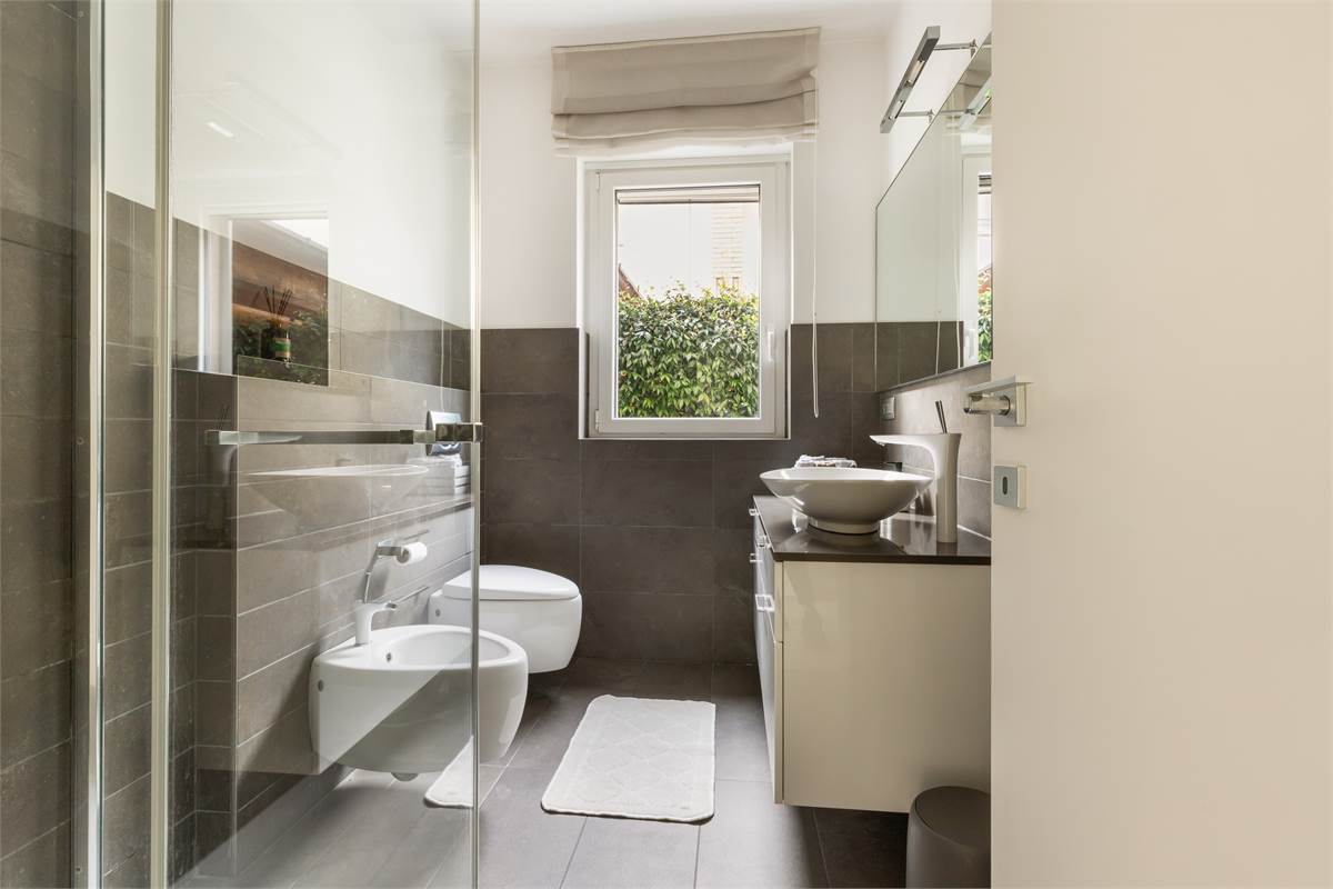 TRILOCALE CON GIARDINO PRIVATO