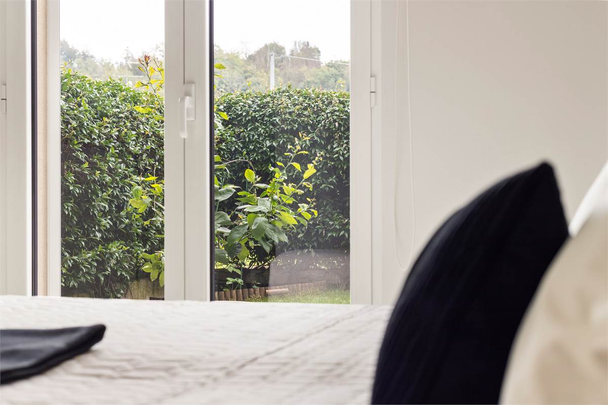 TRILOCALE CON GIARDINO PRIVATO