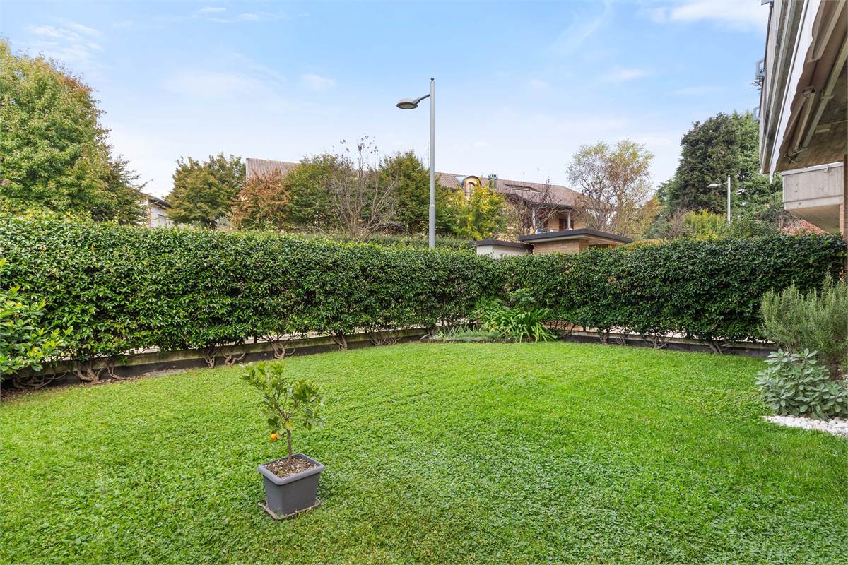 TRILOCALE CON GIARDINO PRIVATO