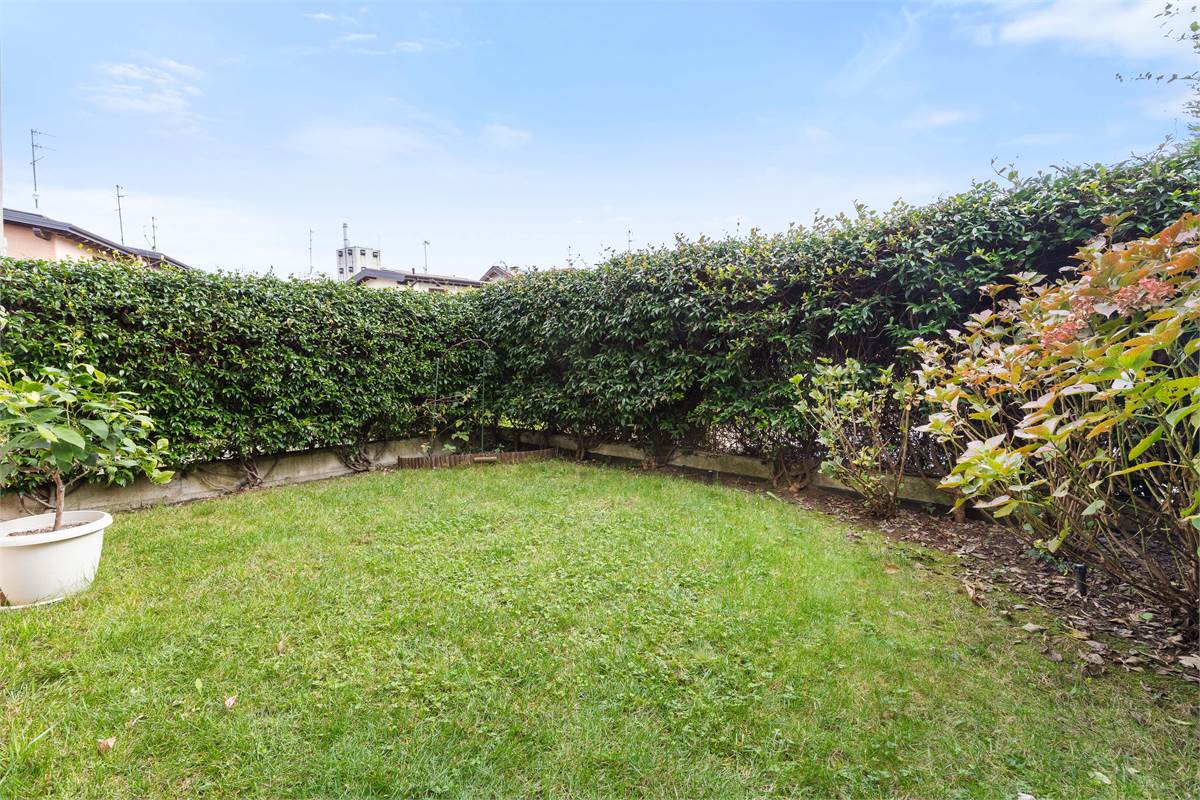 TRILOCALE CON GIARDINO PRIVATO
