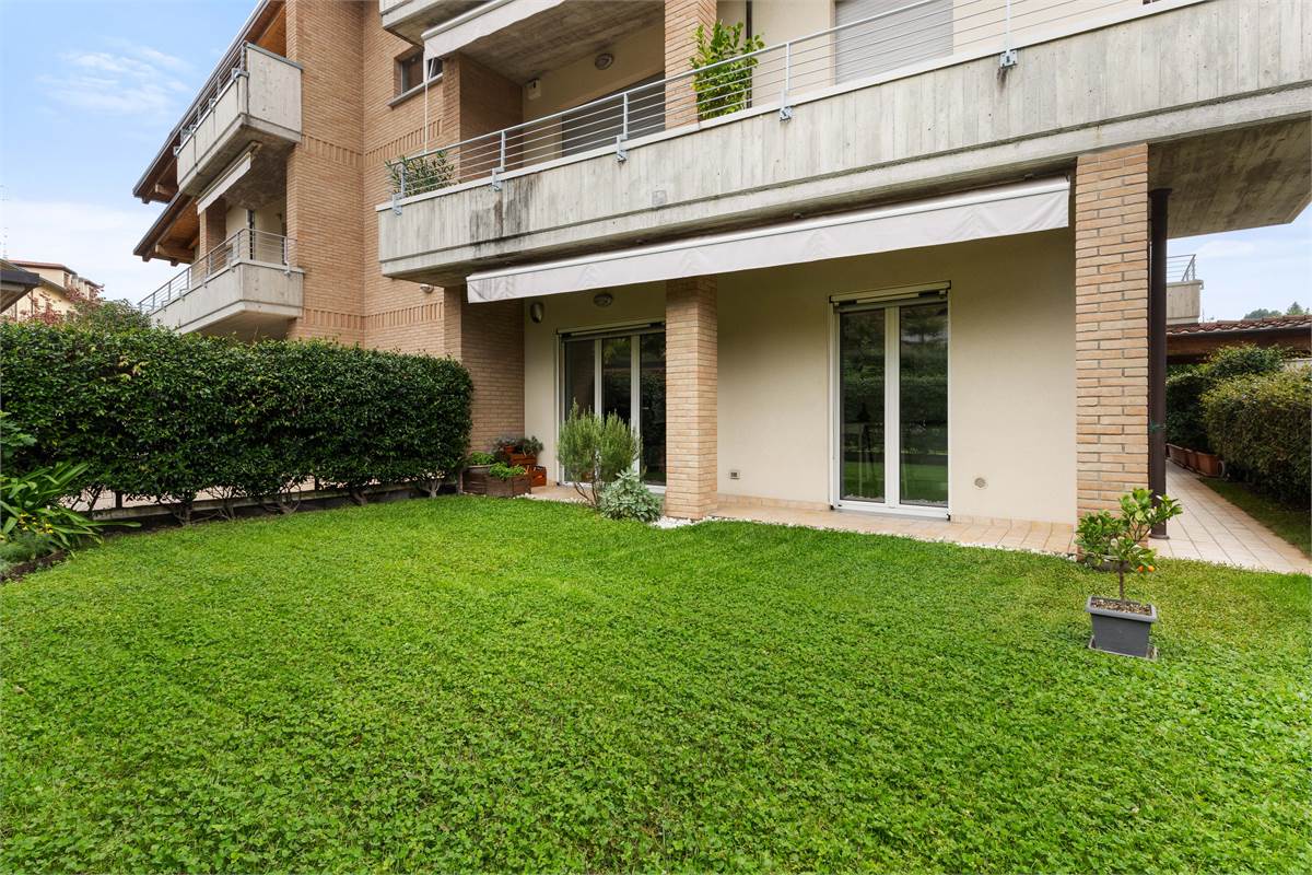 TRILOCALE CON GIARDINO PRIVATO