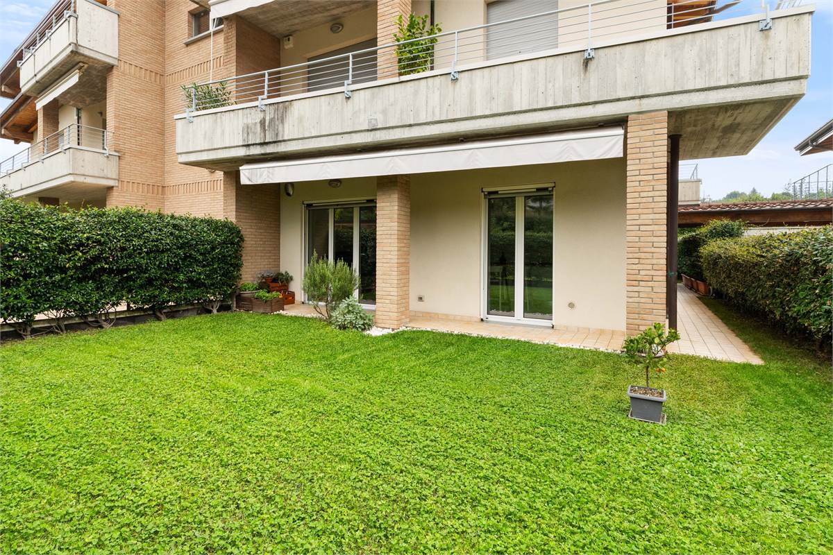 TRILOCALE CON GIARDINO PRIVATO