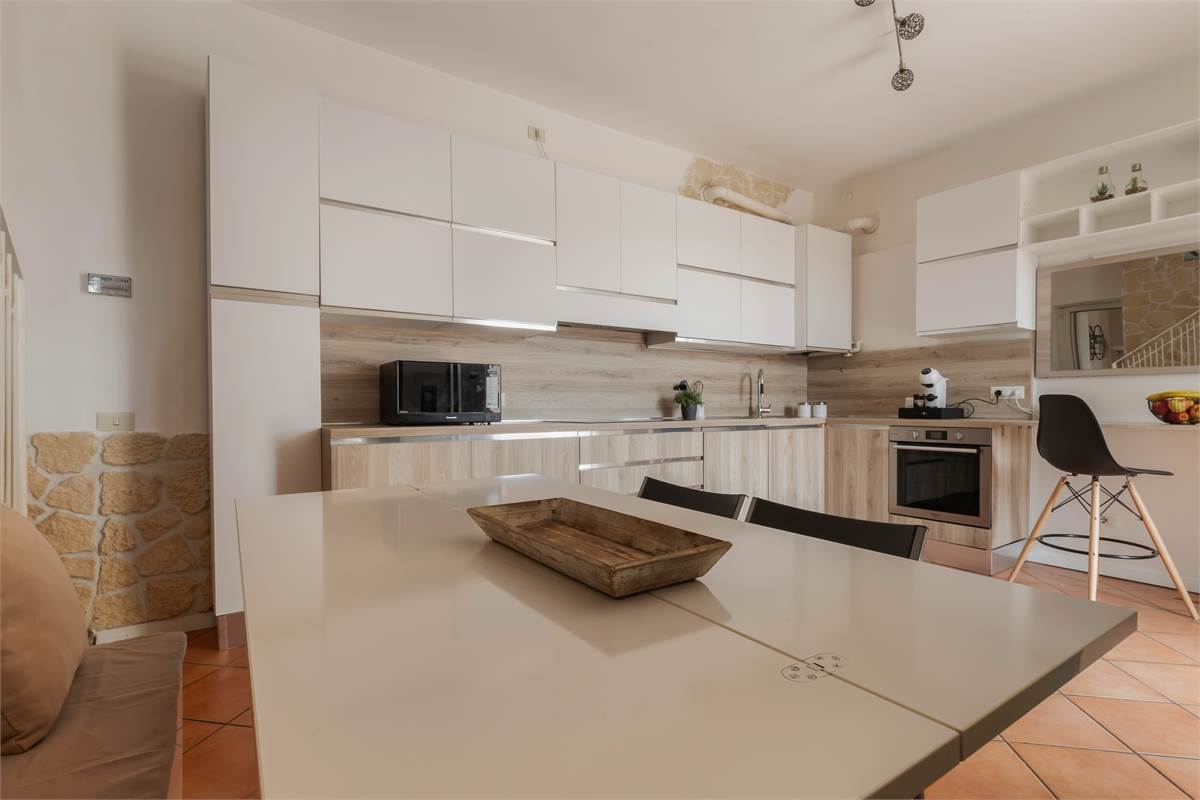 PORZIONE DI CASA CON GIARDINO