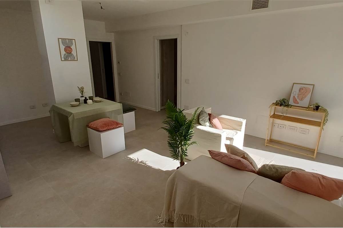 TRILOCALE CON GIARDINO