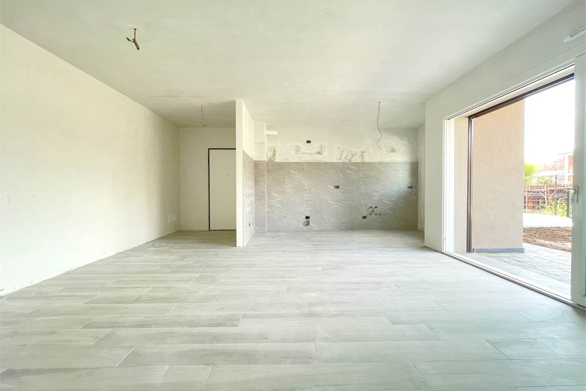 Nuovo trilocale con giardino 