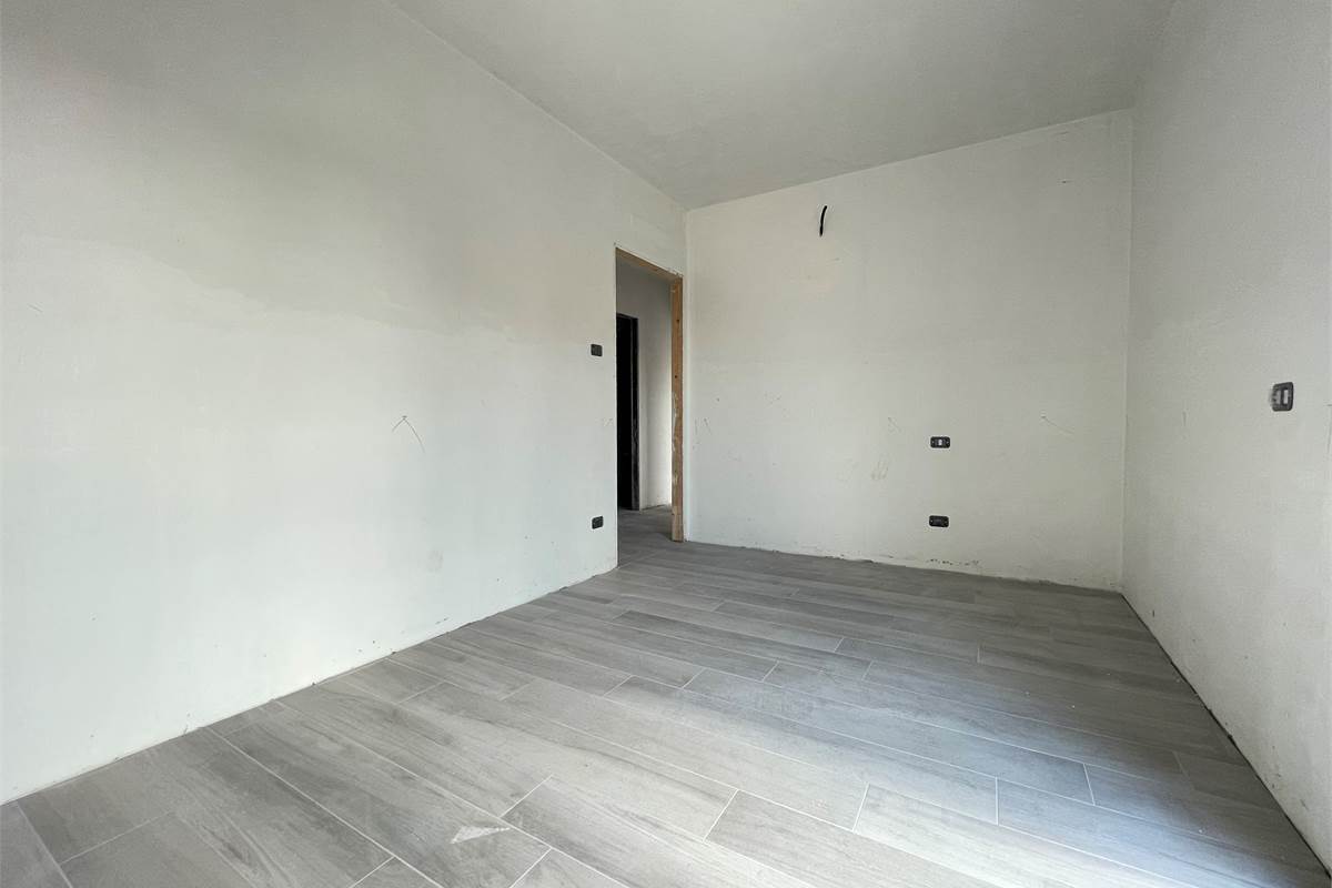 Nuovo trilocale con giardino 