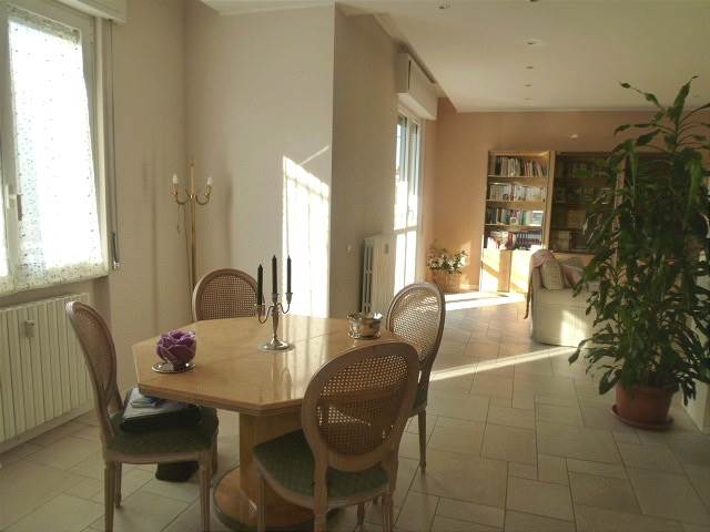 Elegante trilocale con balconi e box
